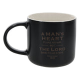 A Man's Heart Plans His Way But the Lord Directs His Steps Black Ceramic Mug