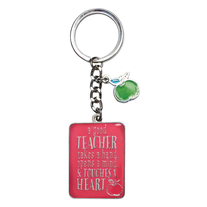 A Good Teacher Takes A Hand Pink Metal Key Ring In A Tin